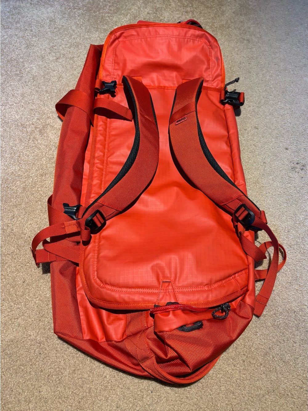 REI Bright Orange Big Haul 60 Bag with Shoulder Straps